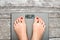 Help to lose kilograms with woman feet stepping on a weight scale