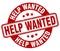 help wanted stamp. help wanted label. round grunge sign