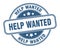 help wanted stamp. help wanted round grunge sign.