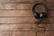 Helpdesk headset on wooden background. Call center.