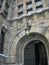 Helsinki, Finland, January 03, 2020. Entrance to the National Museum of Finland. Stone walls, heavy church doors, green glass and