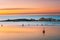 Helsinki, Finland. Landscape With Liuskasaari Pier, Jetty At Winter Sunrise Time. Tranquil Sea Water Surface At Early