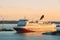 Helsinki, Finland. View Of Modern Ferry Ferryboat Floating At Sunrise Sky