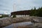 Helsinki Olympic Stadium with puddle reflection