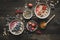 Helthy breakfast. Delicious smoothie bowls with fruits, berries and seeds on the wooden background.