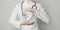 Hematologist doctor, spleen specialist. Aesthetic handdrawn highlighted illustration of human spleen. Neutral grey background,