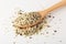 Hemp seeds in wooden spoon