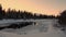 Henan river at sunset near Undersaker town in winter in Jamtland in Sweden