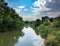 Henares river on its way through the city of Alcala de Henares in Spain