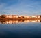 Hendaia is reflected in the water of the beach at sunset