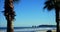 Hendaye beach with a view on the famous twin rocks and a sail boat