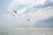 Henichesk, Ukraine - July 12, 2021: Kitesurfing. Practicing kitesurfing at summer beach. Active travel sport recreation.