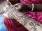 Henna mehendi on hand Indian tattoo making