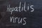 Hepatitis virus text on a chalkboard