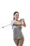 Her golfing career is in full swing. Studio shot of a young golfer practicing her swing isolated on white.