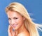 Is it her hair, her skin, or her natural charm that you notice first. Isolated portrait of a gorgeous blonde woman with