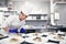 From her hands to you table. a chef plating food for a meal service in a professional kitchen.