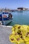 Heraklion, Crete / Greece: Fishing nets, Fishing boat in front of fortress Koules in Heraklion