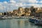 HERAKLION, GREECE - November, 2017: colorful fishing boats and yachts in old Venetian fortress, Heraklion port, Crete