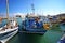 Heraklion, Greece, September 25, 2018, A fisherman sets up his fishing nets on his boat in the port