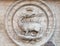 Heraldic salamanders on the facade of Church of St Louis of the French, Rome