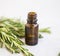 Herbal green rosemary herb essential oil bottle, natural aromatherapy oil