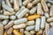 Herbal Medicines / Natural herb capsules texture background