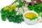 Herbal tea of fresh wormwood leaves, yarrow, St. John`s wort flowers, green nettle