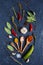 Herbs and spices on black background Food background. measuring spoon . spice spoon Copy space
