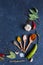 Herbs and spices on black background Food background measuring spoon . spice spoon laurel Copy space