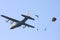 Hercules plane drops parachute troopers