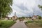 Herd of cows passing a street of Alibunar; a small agricultural village of Voivodina; the main rural region of Serbia