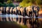 a herd of elephants crossing a river