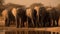 A herd of elephants quenching their thirst at a watering hole created with Generative AI