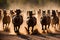 Herd of horses gallop past raising dust