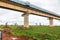 A herd of zebras grazing below the Nairobi Mombasa Standard Gauge Railway passing through Nairobi National Park, Kenya