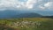 Herdmen tending flock of sheep. Extreme long shot. Herd of sheep are grazing on mountain pasture. Ukrainian nature