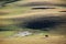 A herdsman of horse in autumn prairie