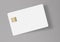 Here is a blank white credit or debit card with a golden EMV chip