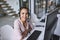 Here to answer all of your questions. Portrait of a cheerful businesswoman talking to a customer using a headset while