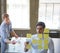 Here, use this one instead. two businessmen preparing for a presentation by using adhesive notes.