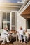 Heres to the start of a relaxing chapter. a happy senior couple toasting with juice on the patio at home.