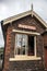 Heritage restored railway station signal box platform building  with Levisham station sign displayed.  North Yorkshire Moors Railw