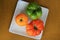 Heritage tomatoes on white plate