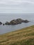 Hermaness National Nature Reserve. View on Muckle Flugga Lighthouse and Out Stack. Unst. Shetland Islands. Scotland