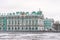Hermitage museum - Winter Palace building on Palace Square river Neva and ice in winter.