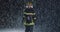 Hero shot, portrait of tired American female firefighter standing taking off her protective helmet, looking into camera