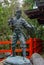 A hero statue at ancient Shinto temple