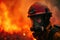 A heroic firefighter battling a raging wildfire
