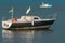 A heron on the top of a sailing boat, near the Jabaquara Beach, in Paraty, Brazil